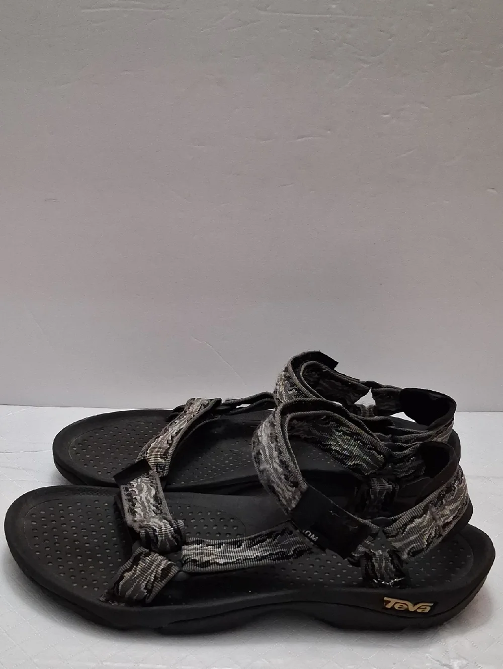 Teva Size 10 Men's Sandals with Gray Patterned Velcro Straps With Black Sole.